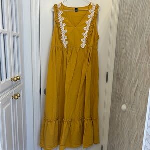 Yellow Sleeveless Dress with Floral Detailing